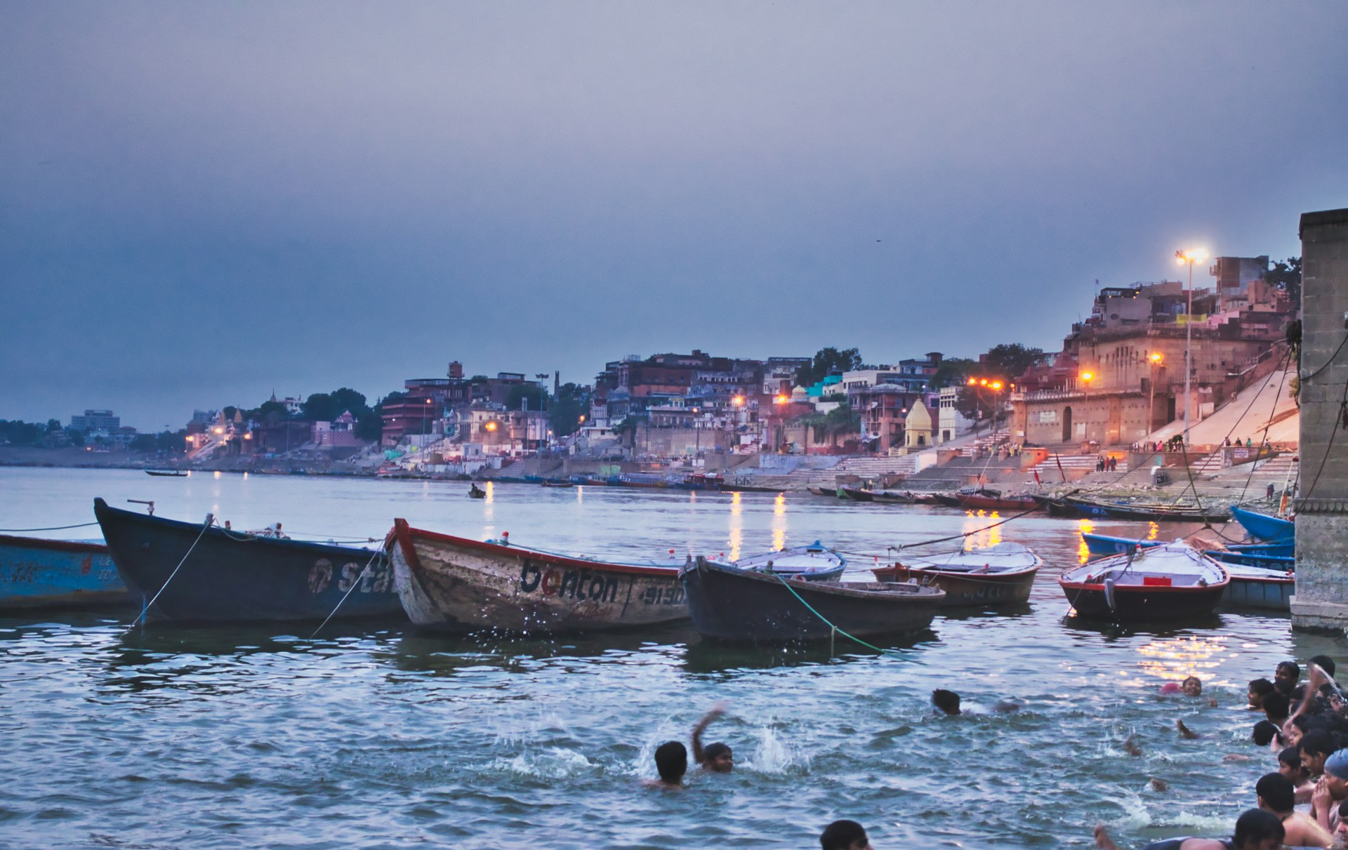 Boat ride — wooden boat, river, sunset