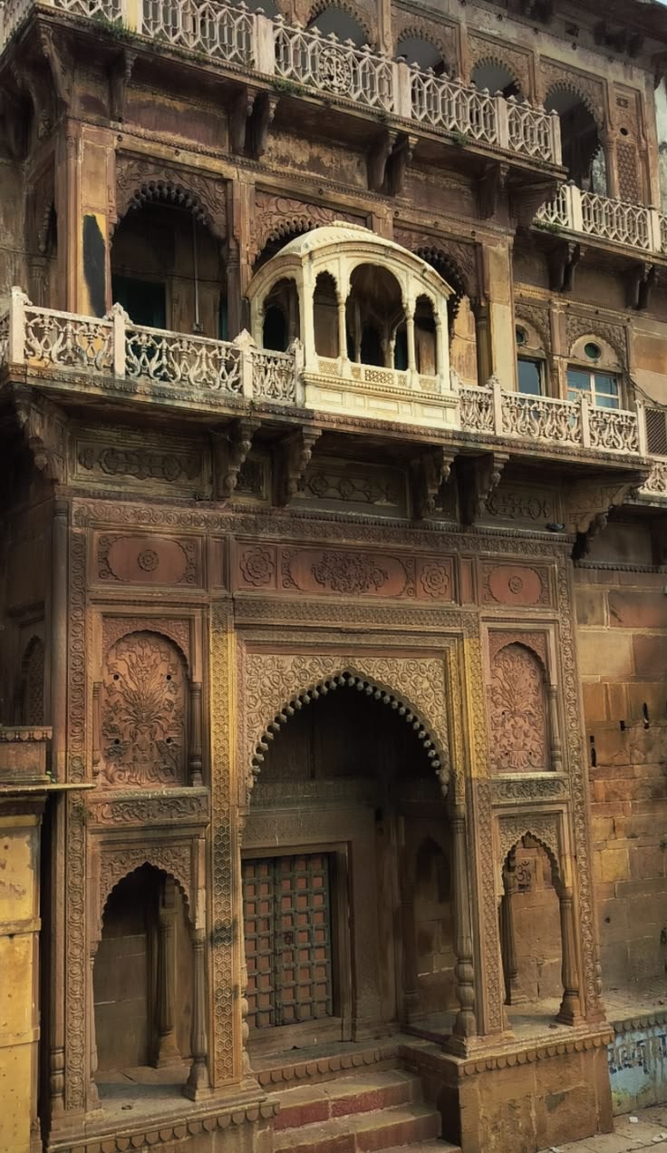 Ramnagar Fort from the river — sandstone walls and balconies above the far bank of the Ganga